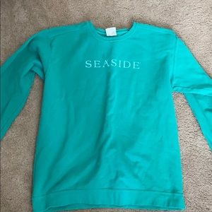 Seaside teal sweatshirt.